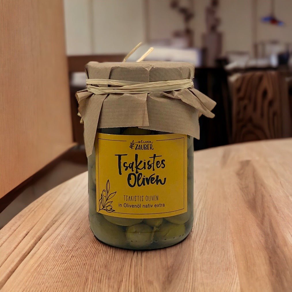 Grüne Tsakistes Oliven mit Zitrone eingelegt in Olivenöl nativ extra - OlivenZauber - Olivenöl neu erleben
